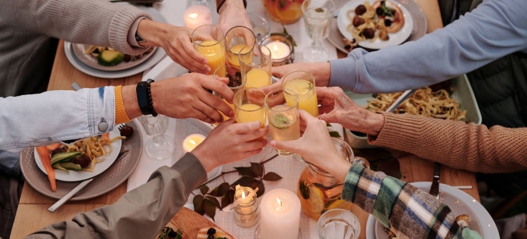 People cheering at a garden party.