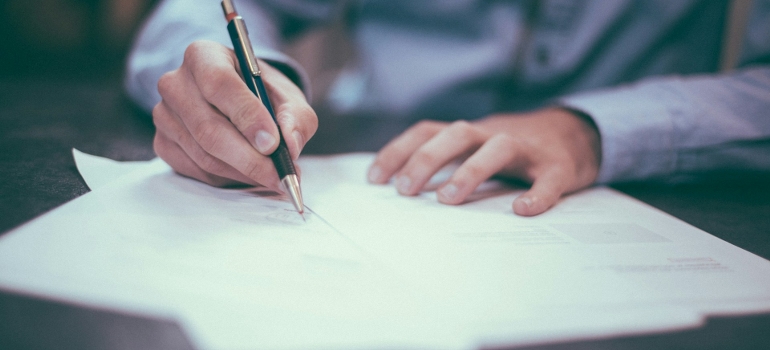 signing papers before moving your business to Sudbury