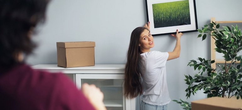 taking a painting off the wall