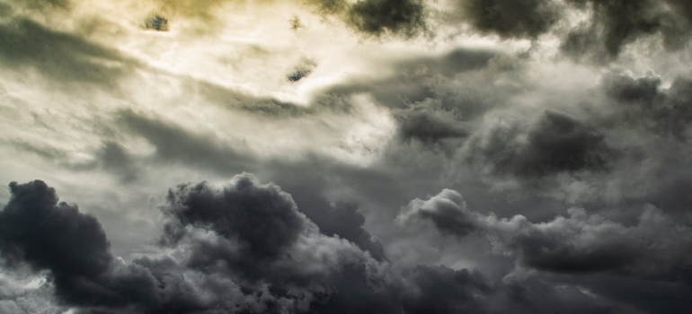 grey clouds before you move in the snow